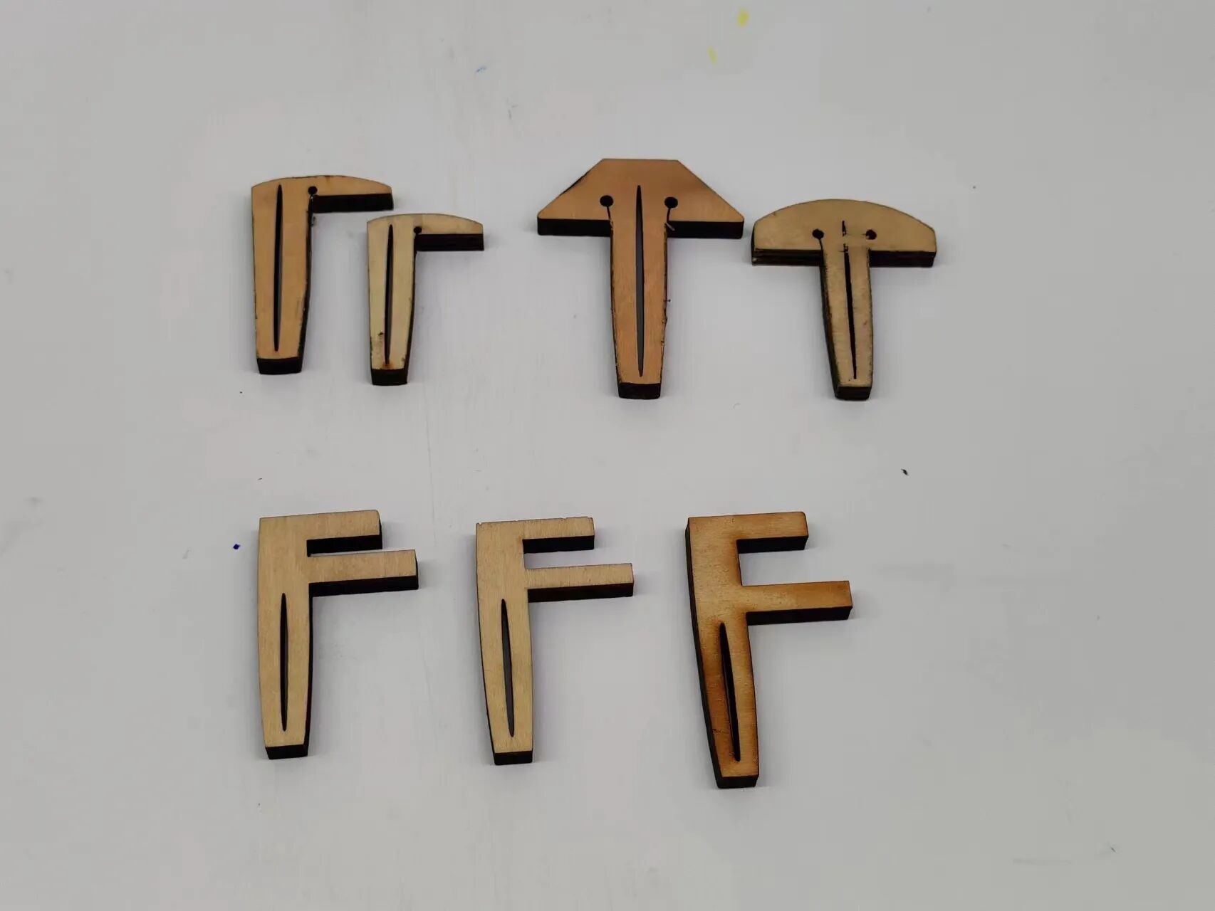 1779785065543364.jpeg Different types of laser cut pins for material flatness