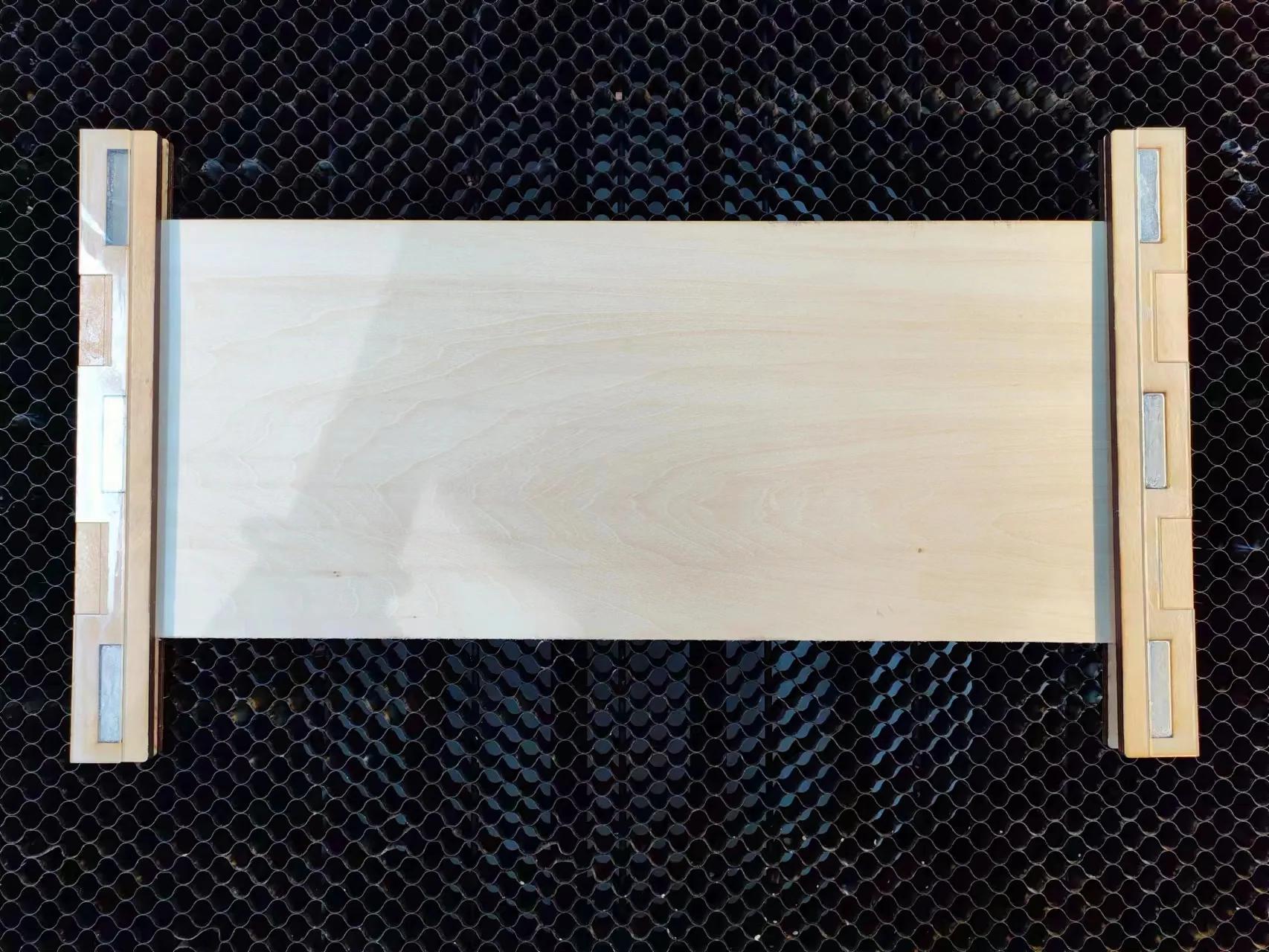 1779785200823368.jpeg Wood clamp application on honeycomb bed