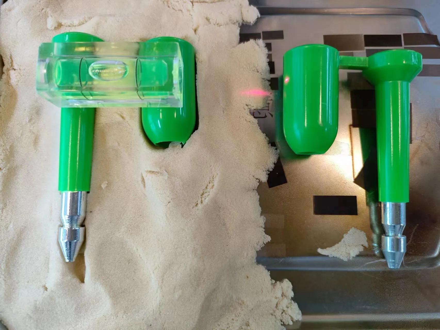 1779785367931726.jpeg Kinetic sand support for irregular laser processing material