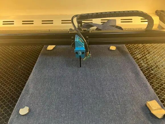 1779785395514317.jpeg Magnets securing fabric on acrylic backing