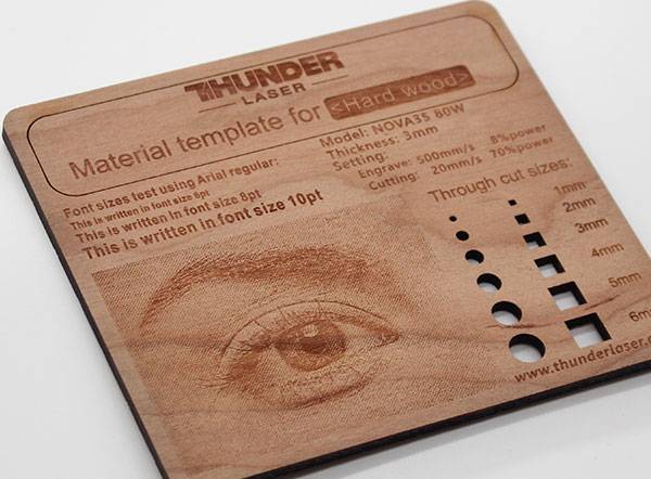Laser-engraved message on a wooden sign