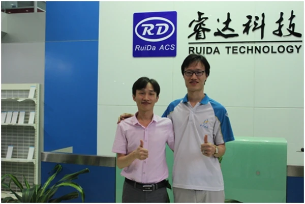 RuiDa General Manager Chengzhu Xiao and Thunder Laser General Manager King Chen