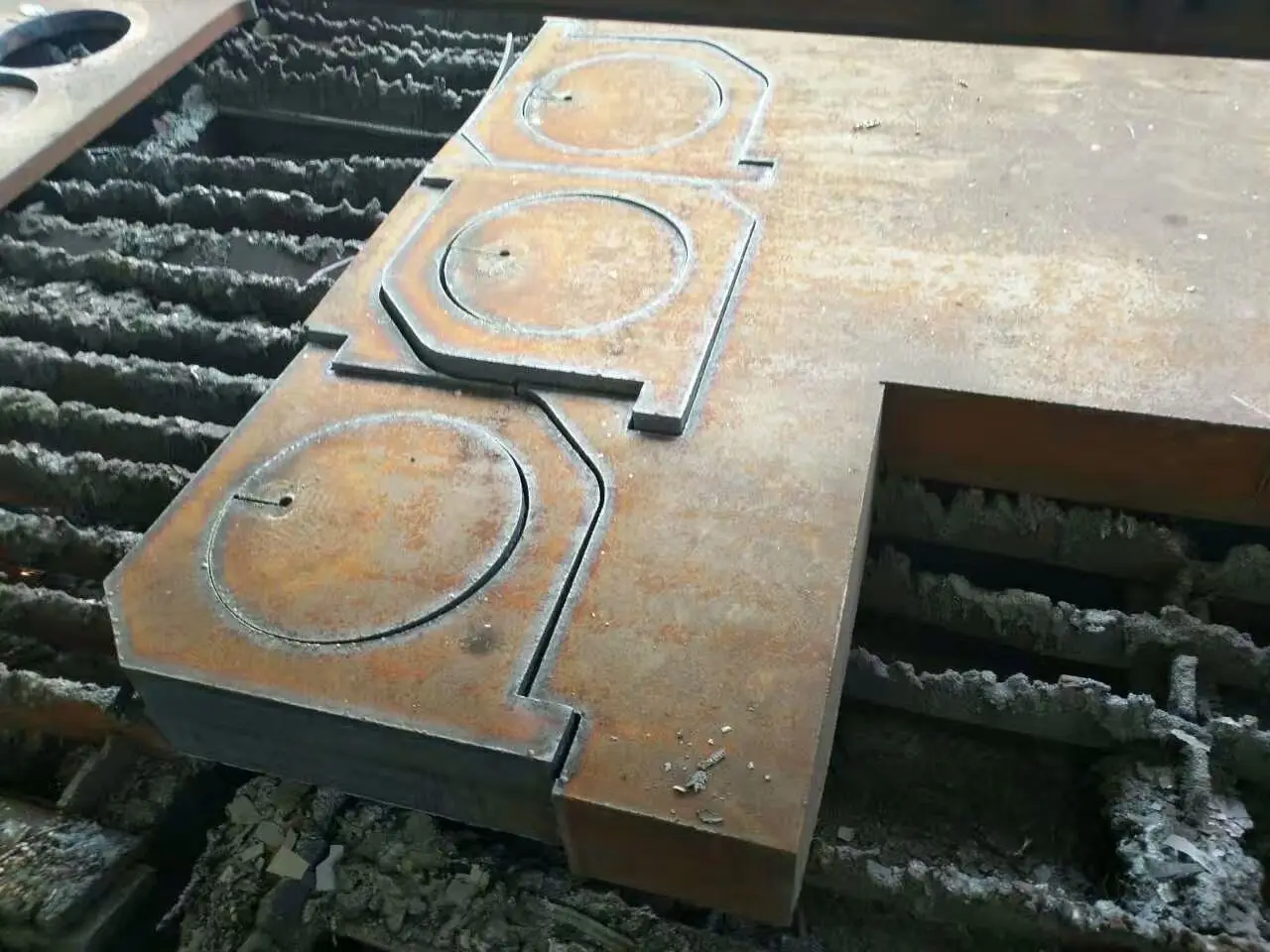 Laser engraved and laser cut metal sample