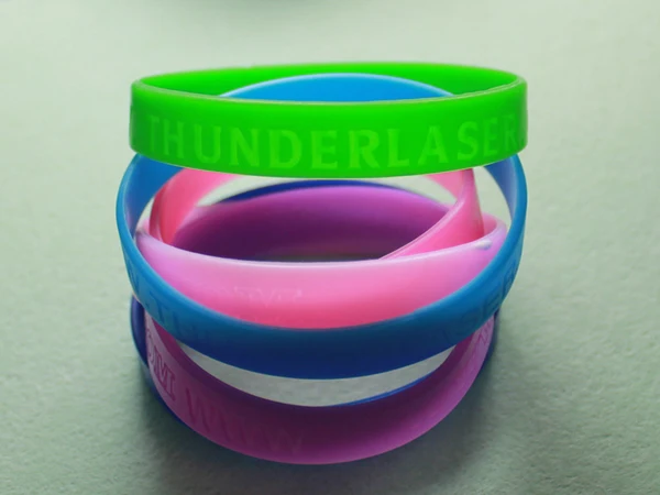 Laser-cut rubber ring and creative artwork