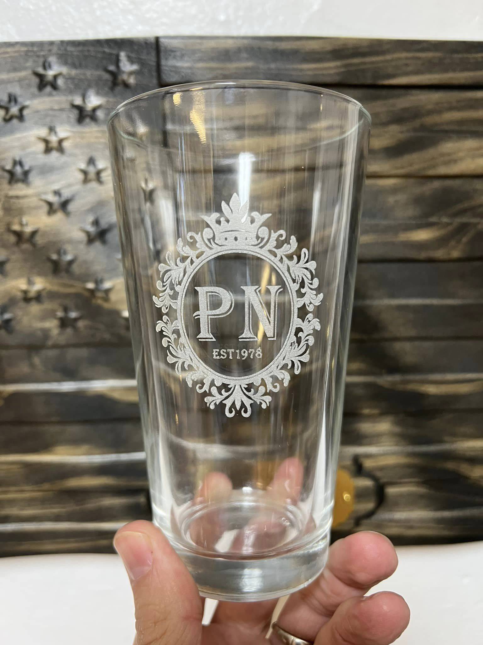 Laser engraving glass with a rotary attachment