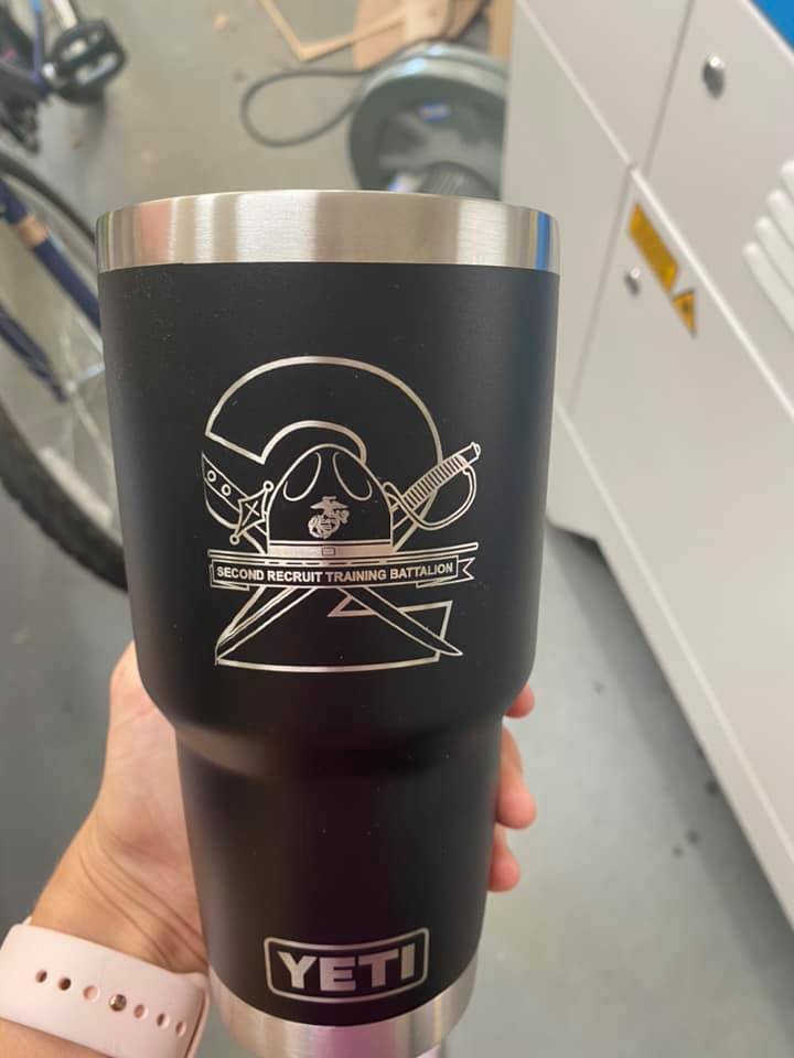 Laser engraving tumblers with a rotary attachment