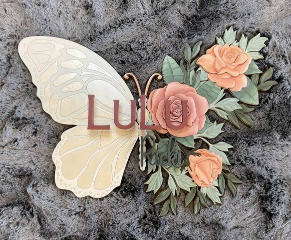 Laser-engraved wooden flower artwork