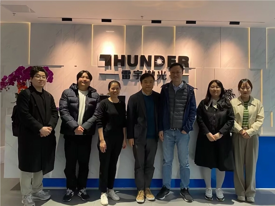 Thunder Laser team discussing Thunder Bolt with Korea agent Choi