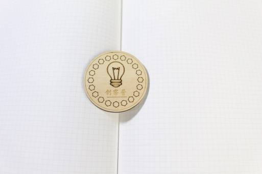 Laser-cut badge design inspiration example 5