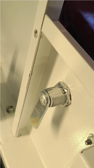Check that the lock tang releases the pass-through panel