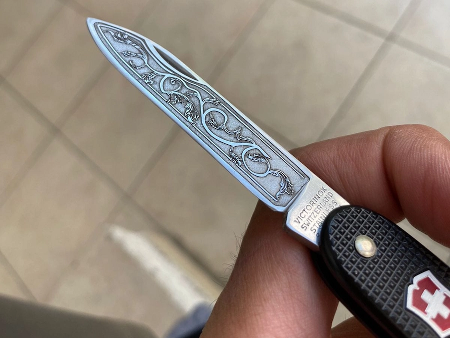 Laser engraved knife decoration