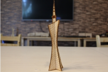 Assembling two crossed Canton Tower laser-cut parts