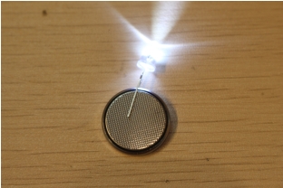 Installing LED and button battery on the Canton Tower model