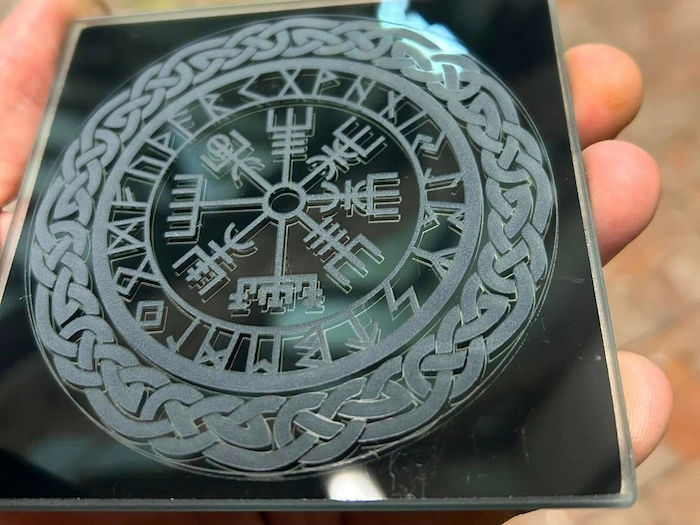 Personalized glass coasters made with laser engraving