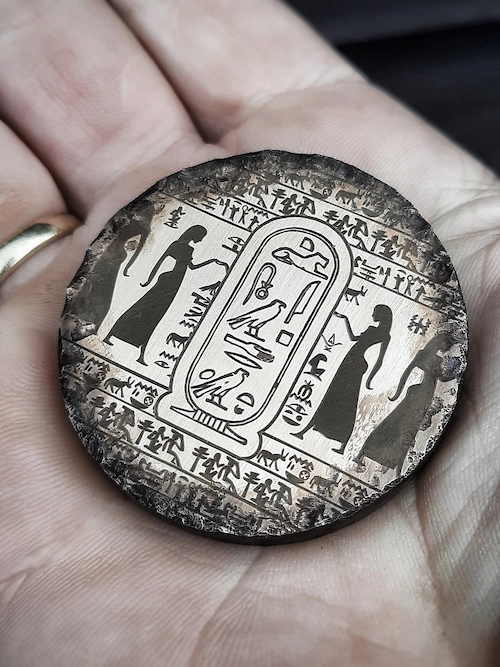Laser engraved brass and copper jewelry sample