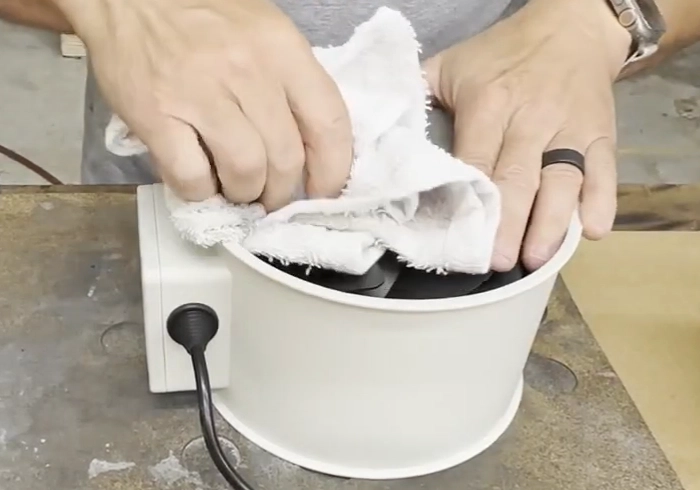 Clean the exhaust fan with a towel