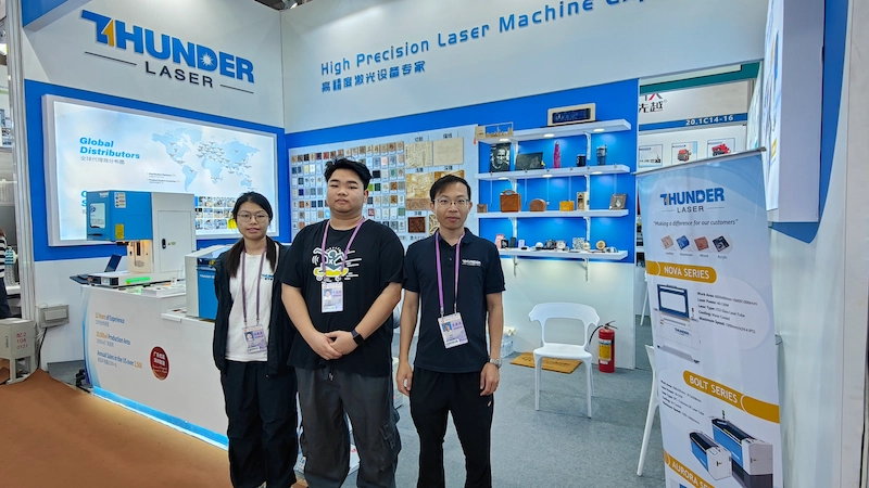 Thunder Laser team members at the 136th Canton Fair
