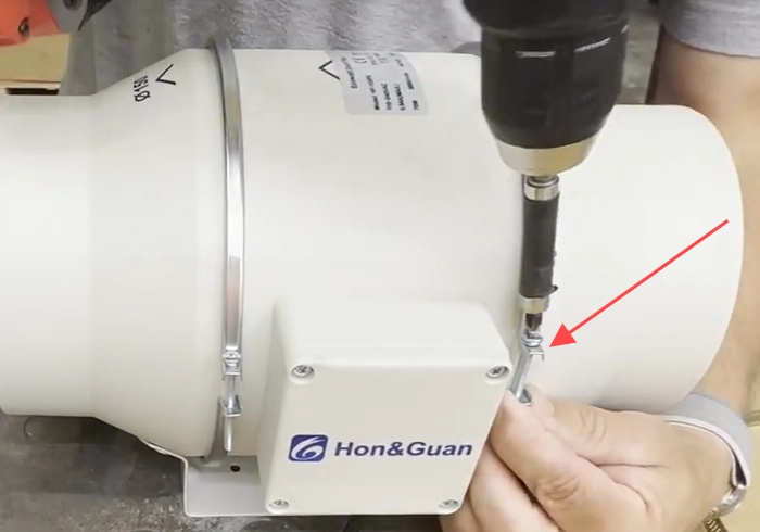 Loosen one band clamp screw