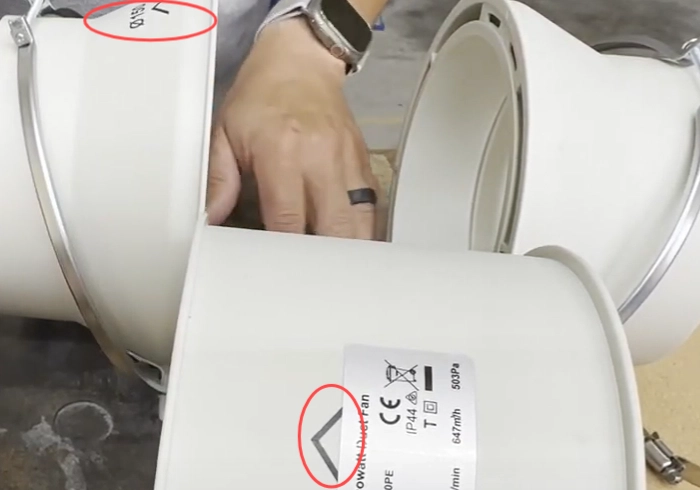 Reassemble the exhaust fan in the correct direction