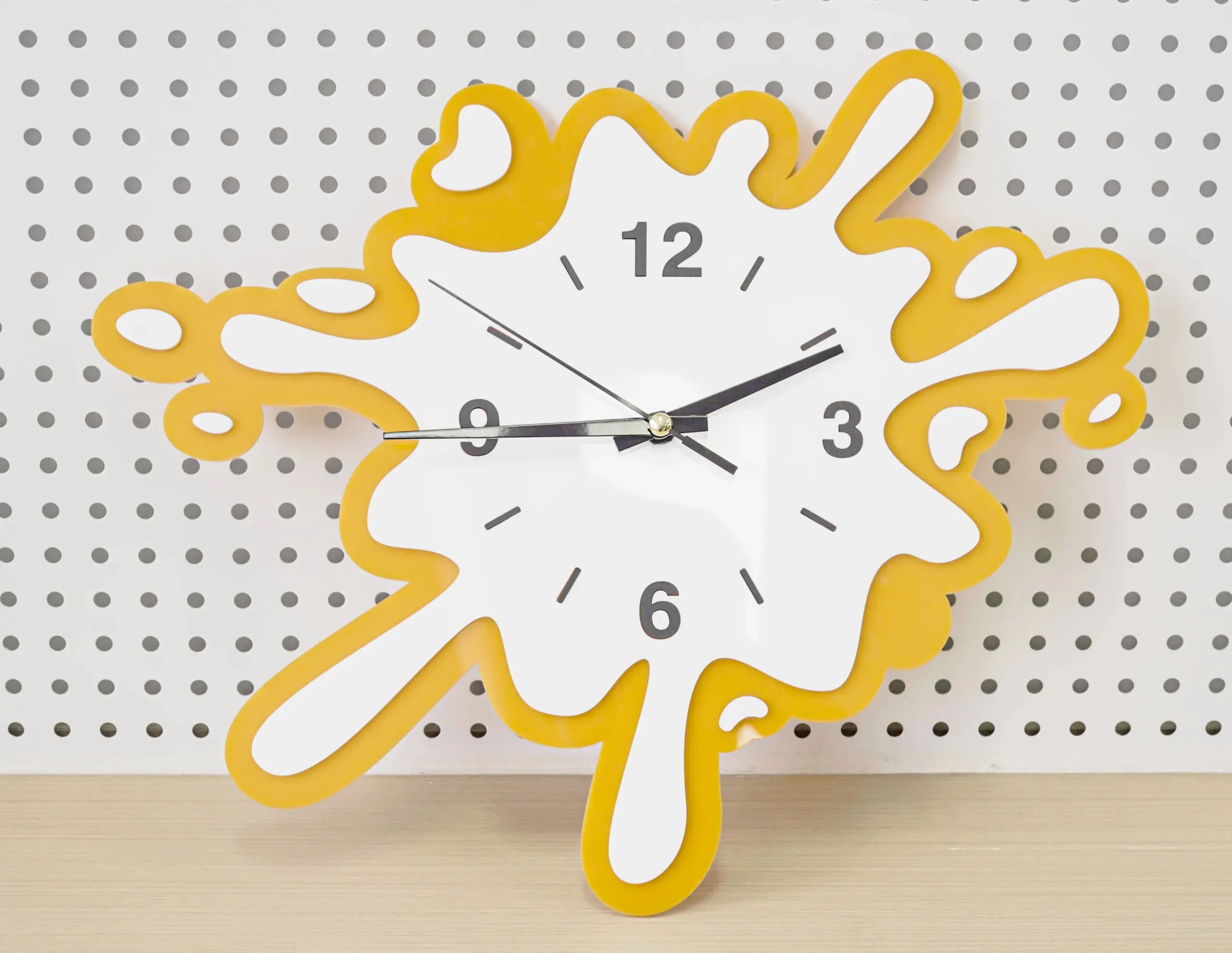 A laser cut acrylic clock made with a Thunder Laser Bolt 30W machine