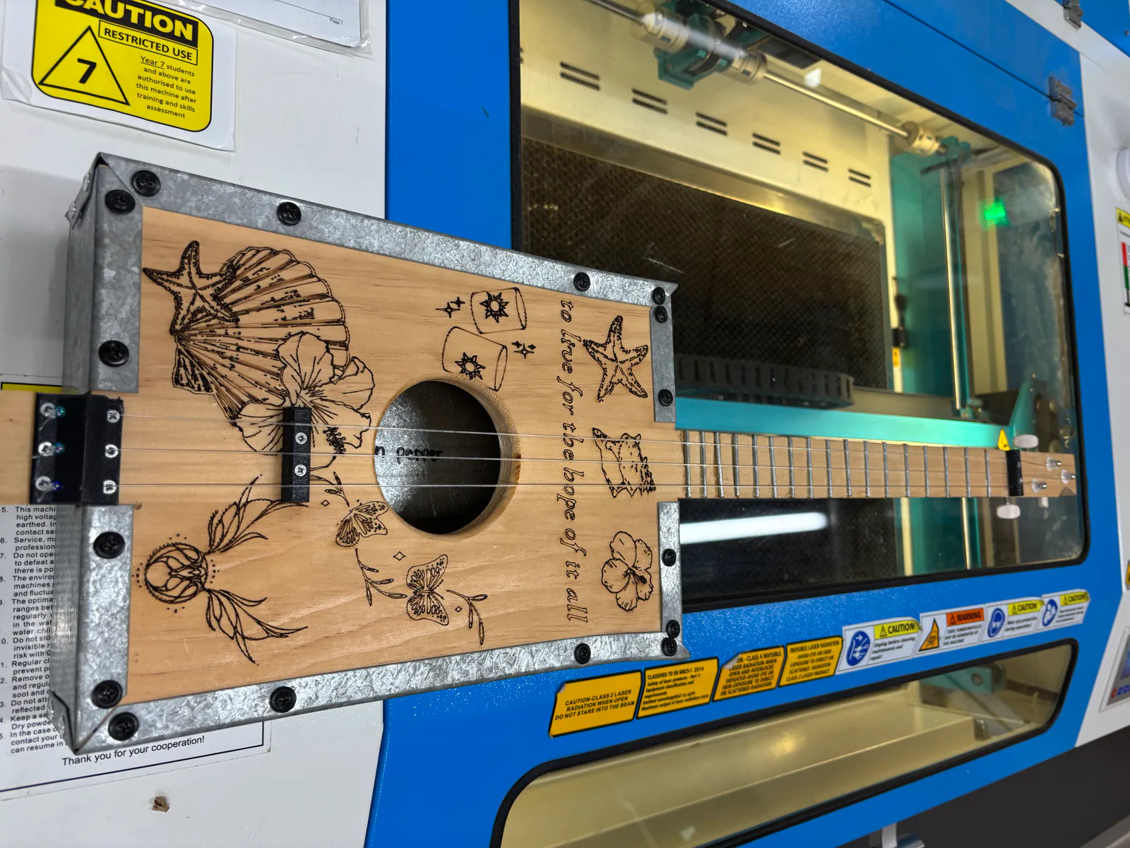 Student laser-cut guitar project at St Benedict's College in Australia