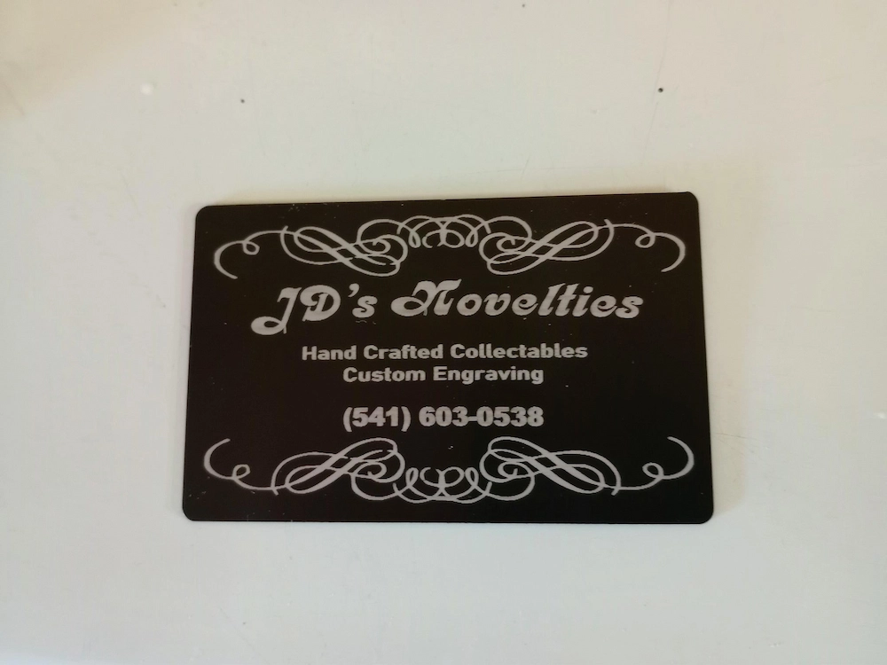 Laser engraved aluminum business card