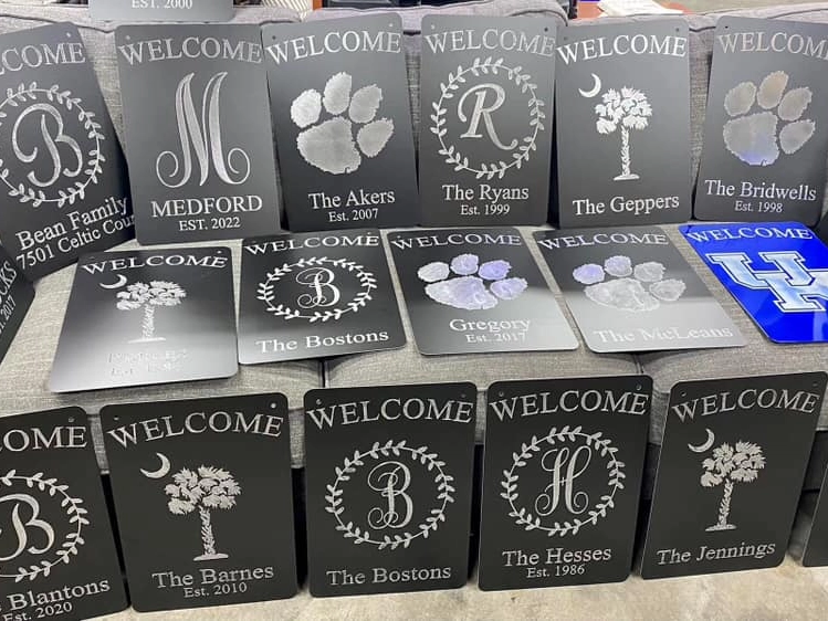 Laser engraved aluminum invitations