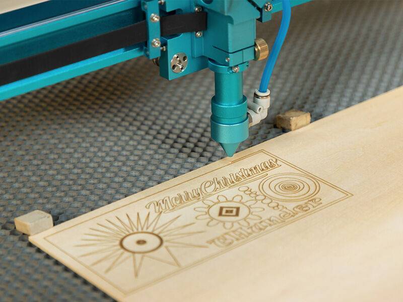 Laser printing design tested on a wooden material