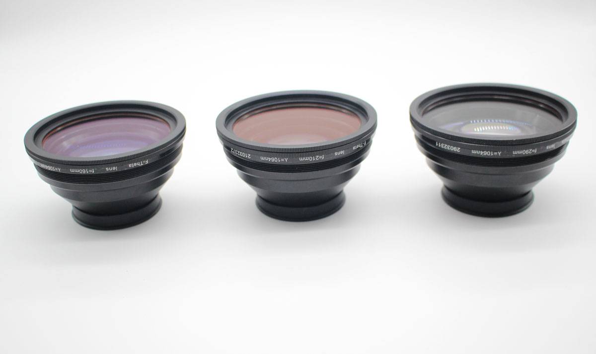 three camera lenses