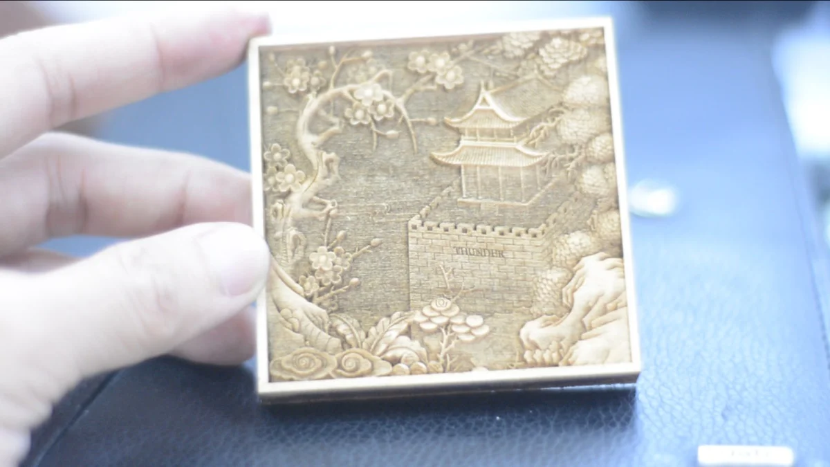 3d laser engraving of a japanese pagoda with a tree and flowers on the foreground