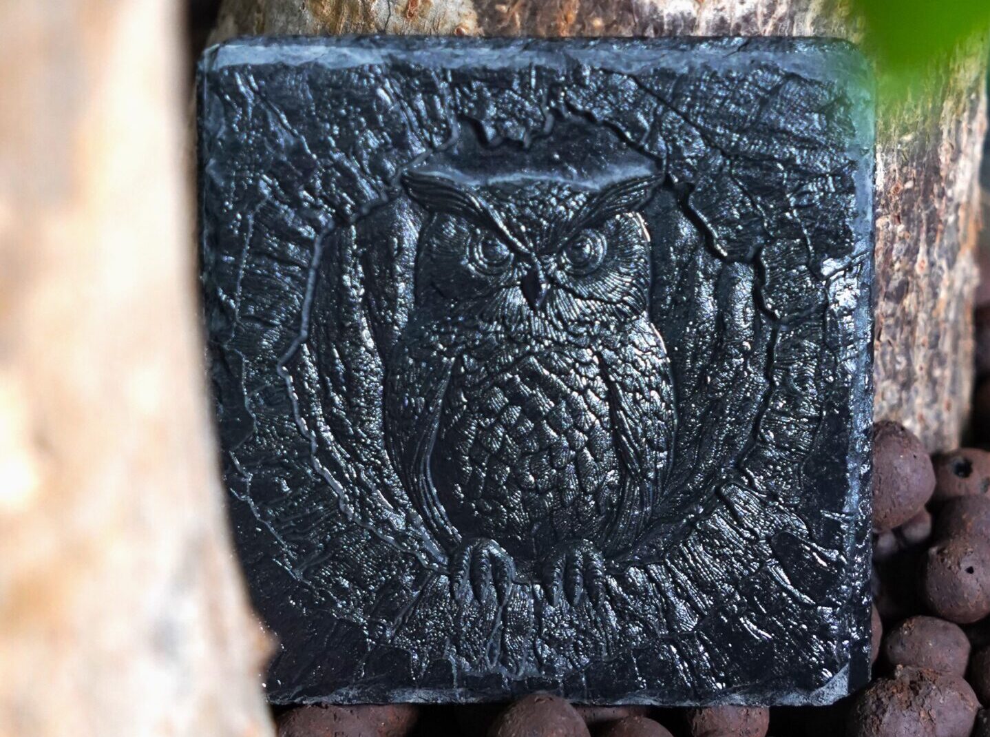 3D relief owl marking on slate