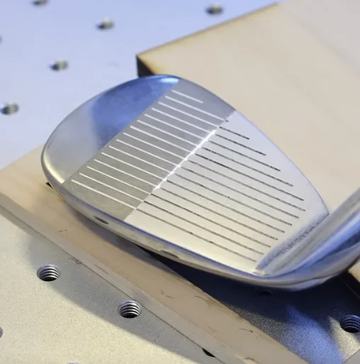 laser creates a clean white layers on golf club