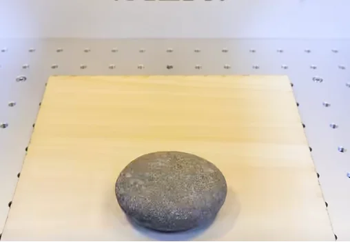 pebble on laser bed