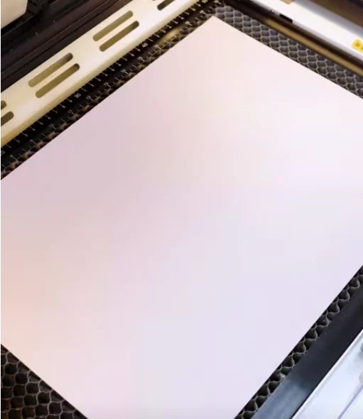 colorful paper on laser bed