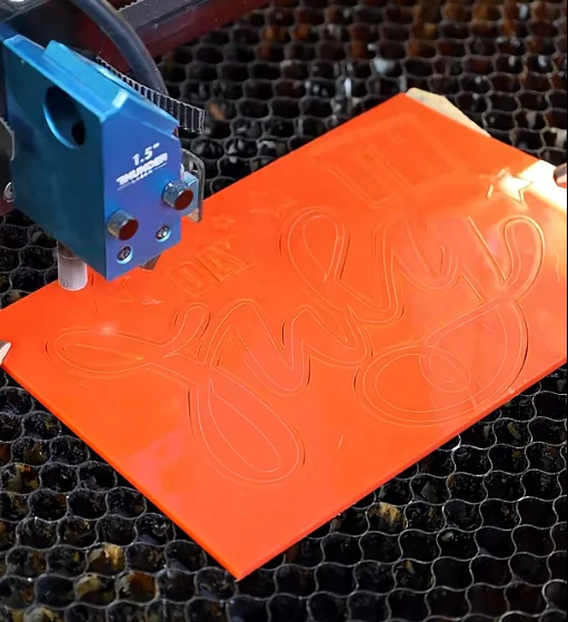 laser cutting red acrylic for 4th of July decoration