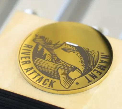 laser marking black fishing design on brass pin