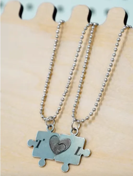laser marking puzzle necklaces done