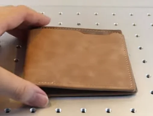 leather wallet on laser bed