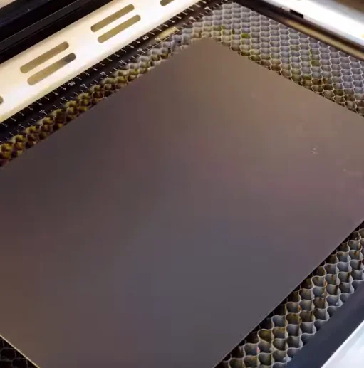 scratch paper on laser bed