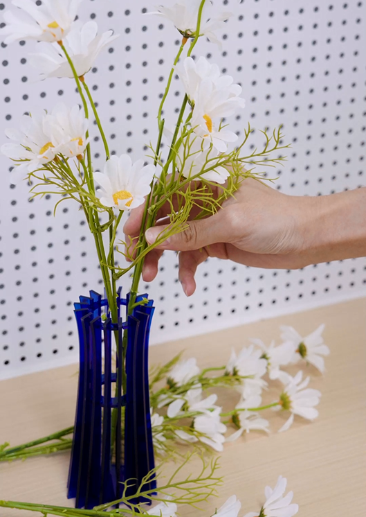 a beautiful laser cut acrylic vase