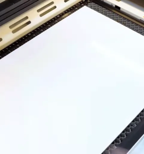 white acrylic on laser bed