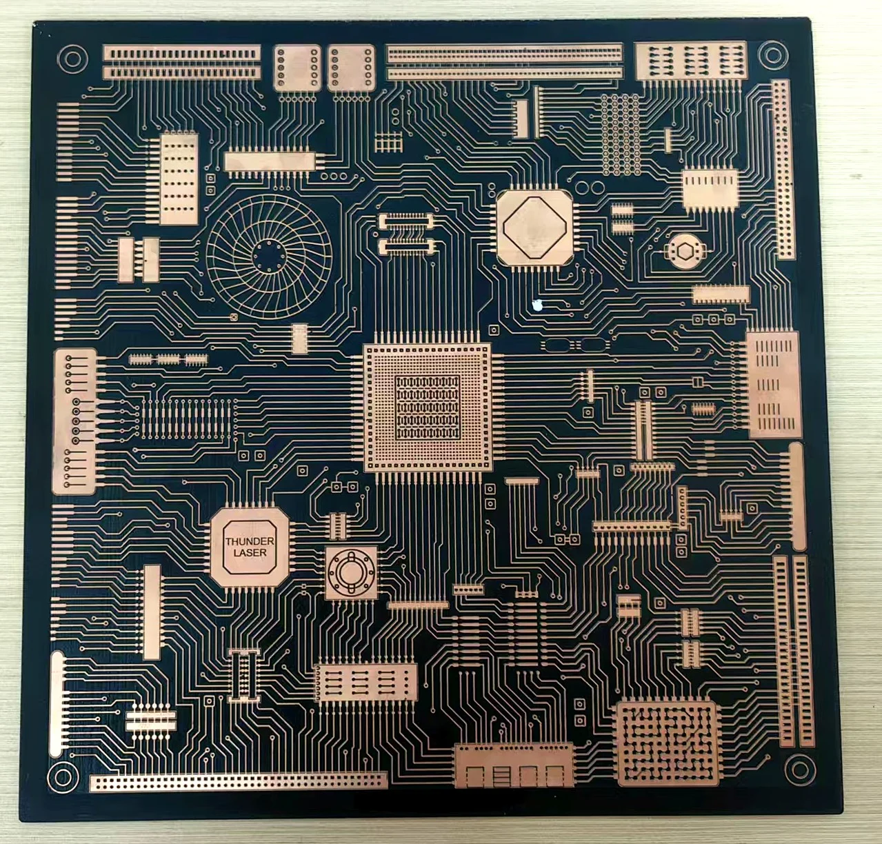 A laser engraved PCB using an RF laser source
