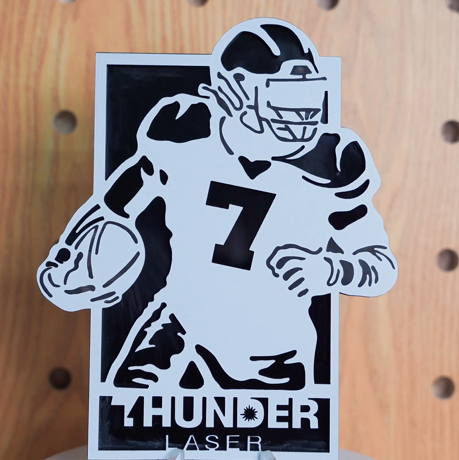 A laser well cut decoration that celebrate the NFL season in 2025