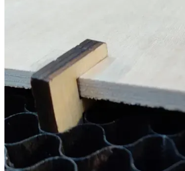An F-shape pin used to secure the 3mm plywood