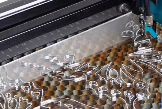 laser cutting the acrylic for making a display stand
