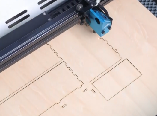 Laser cutting a flip lid tool box