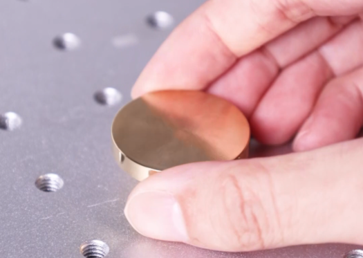 Put the brass stamp on the work table