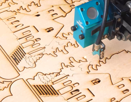 laser cutting a wooden christmas decor