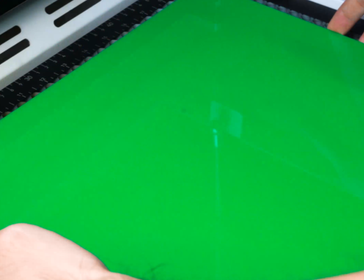 put the green acrylic on the work table