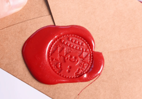 wax pattern made with christmas stamp